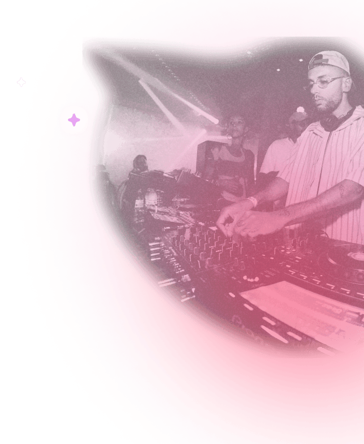 A DJ mixing music in front of a crowd of people